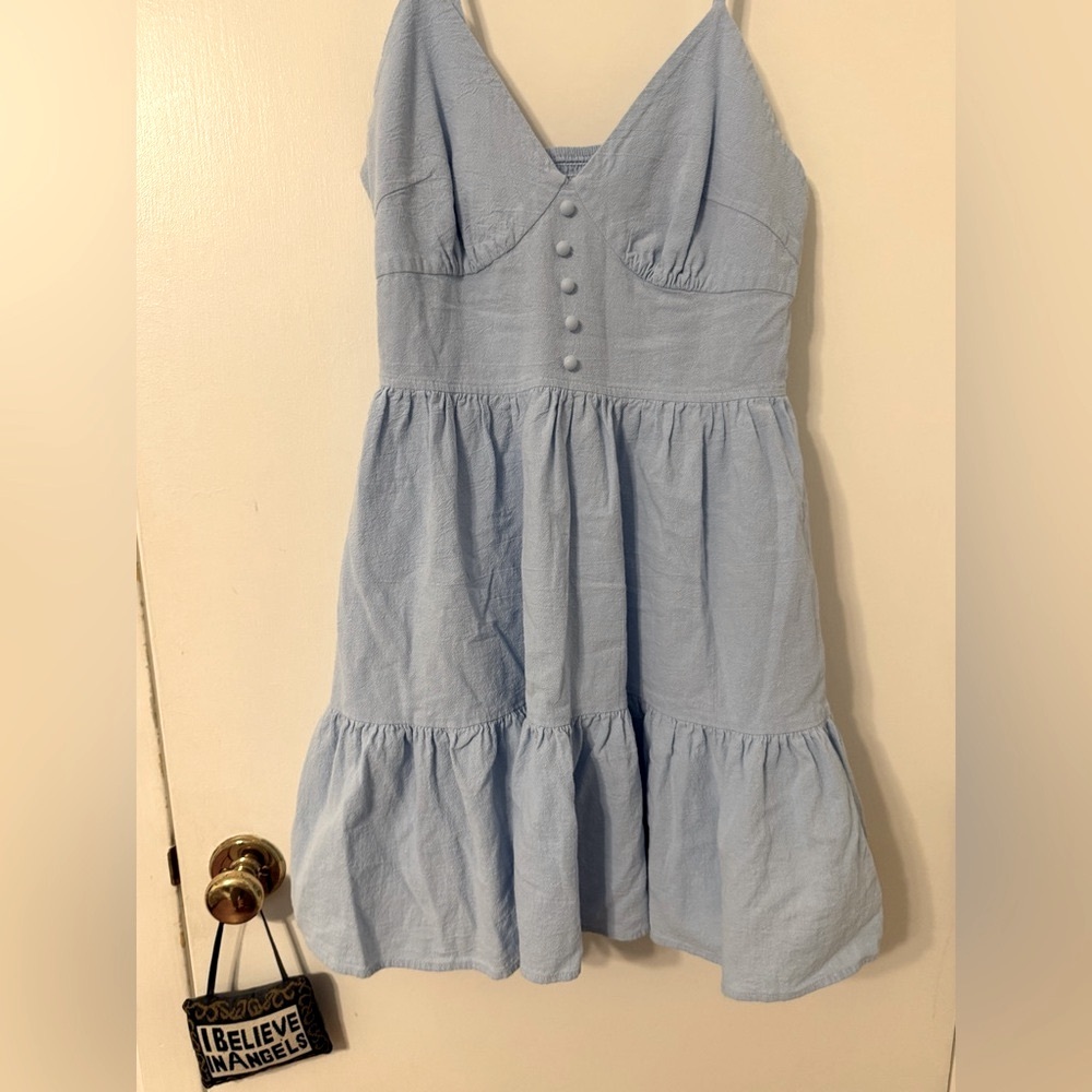 Chambray look light blue sundress with covered button details